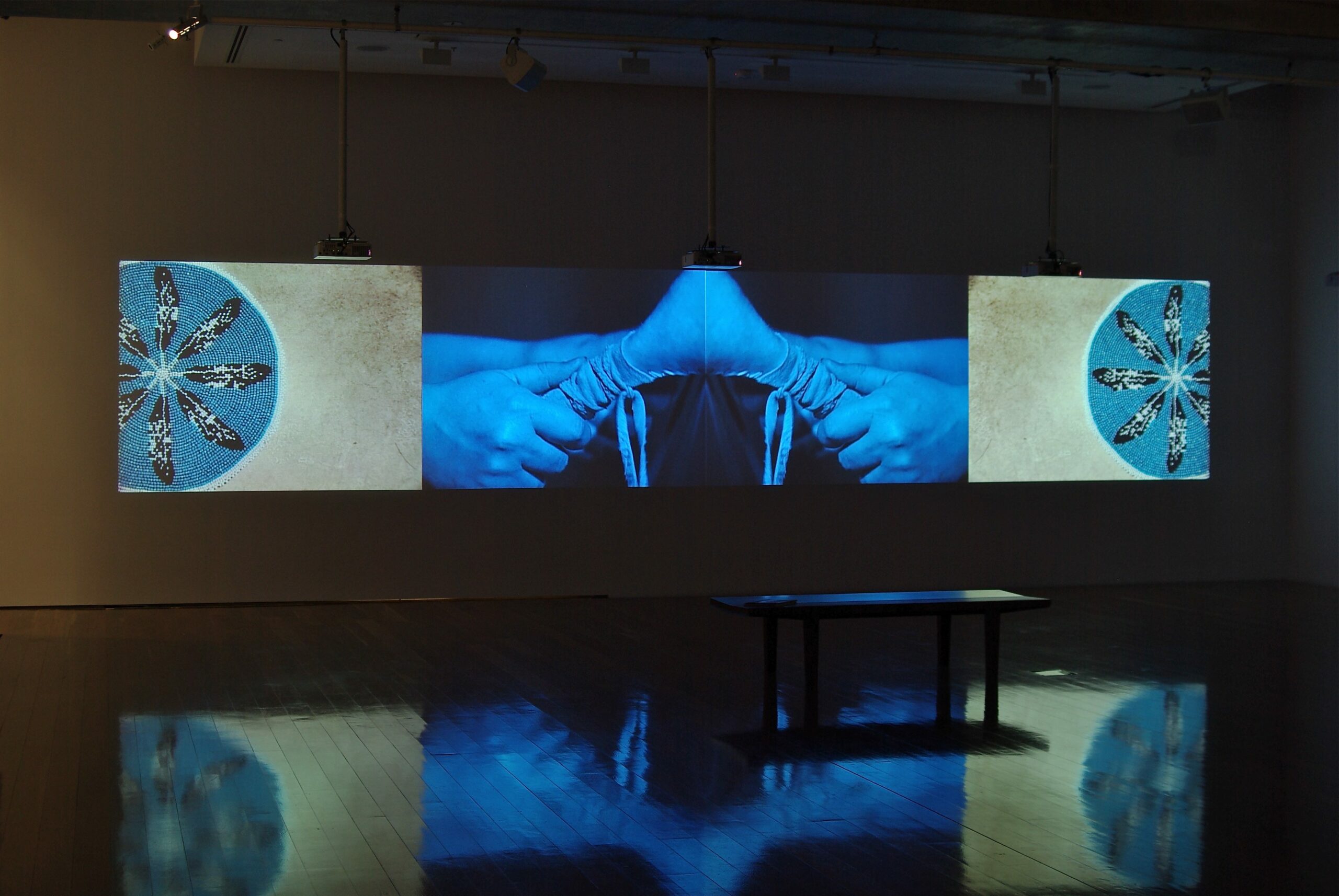 Installation view, Dana Claxton, Rattle, 2003, four-channel video installation with sound, 11:10 min. Collection of Remai Modern. Purchased with the support of the Frank and Ellen Remai Foundation, 2019.