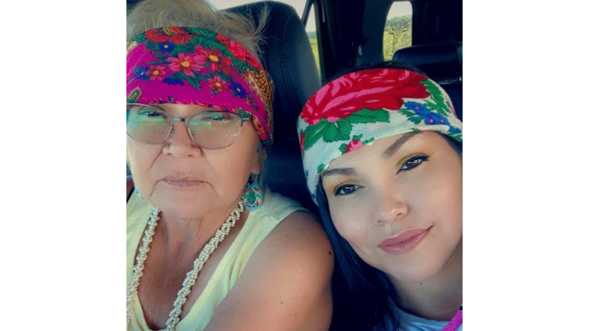 A photo of Bree Kookum and her mom wearing colourful scarves