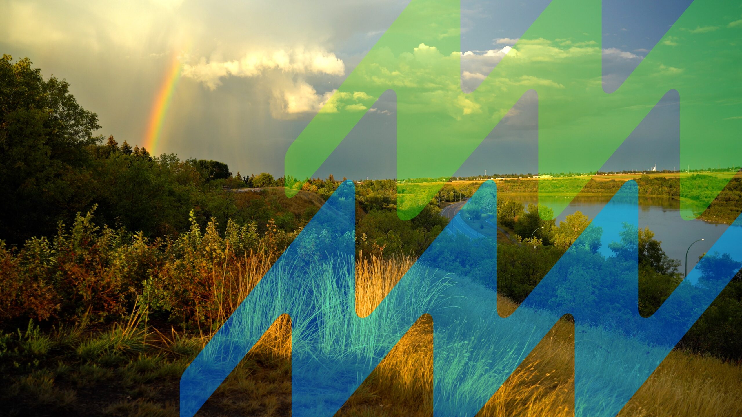 AVisionForTheValley MainImageV2 FullRes A scenic river valley with trees, grassy hills, and a winding road under a cloudy sky with a visible rainbow, overlaid with large semi-transparent blue and green graphic shapes.